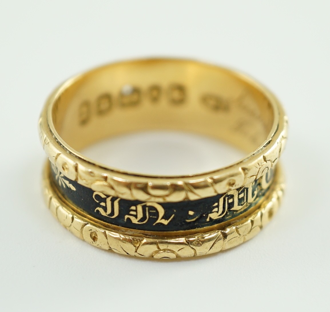 A George IV 18ct gold and black enamel 'In Memory Of' mourning band, with carved scroll border